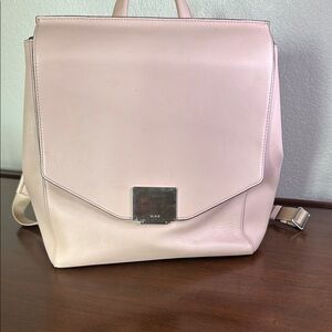 Pink Leather Backpack with Flap Closure and Metallic Clasp